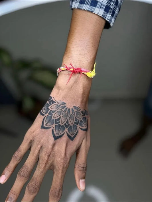 Medium Dotwork Mandala Tattoo on Men Wrist by @nageshart_7