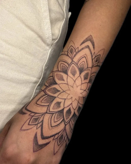 Medium Dotwork Mandala Tattoo on Women Wrist by @tattoo_miss_