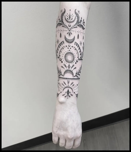 Medium Dotwork Moon Phases and Mandala Tattoo on Women Forearm by @magdalenasky