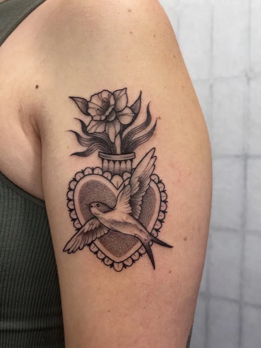 Medium Dotwork Sacred Heart Flower Bird Tattoo on Women Arm by @danidaltontattoo