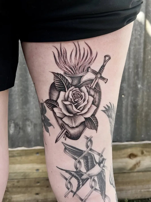 Medium Dotwork Sacred Heart with Sword and Swallow Tattoo on Women Thigh by @_bootattoos
