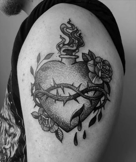 Medium Dotwork Sacred Heart with Thorns and Roses Tattoo on Men Arm by @hashbrown_tattoos