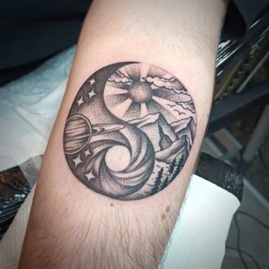 Medium Dotwork Yin Yang with Mountains and Sun Tattoo on Men Arm by @steelcitystylesheffield
