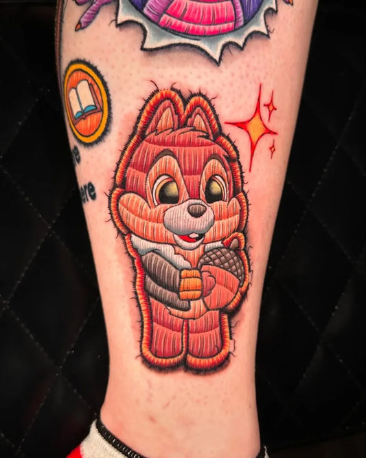 Medium Embroidery Chipmunk with Acorn and Stars Tattoo on Women Leg by @cj_ugarte