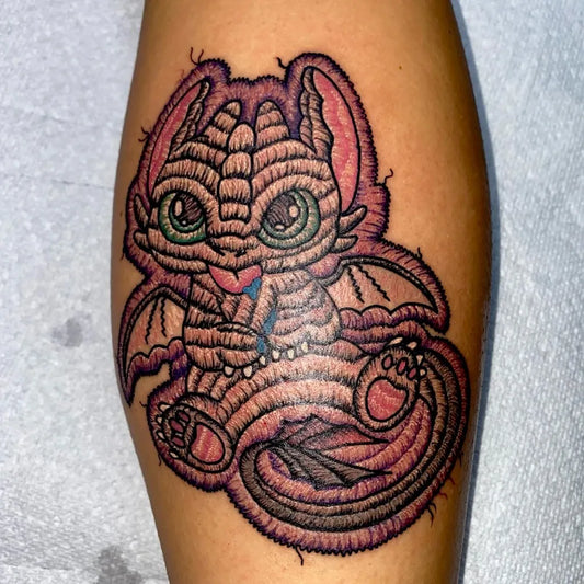 Medium Embroidery Cute Dragon Tattoo on Women Leg by @marissa_orrickink