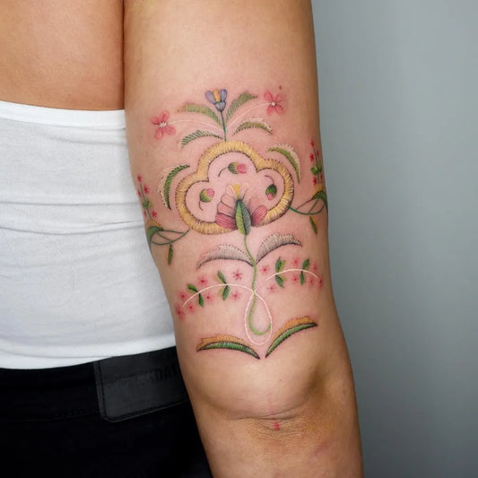 Medium Embroidery Floral Motif Tattoo on Women Arm by @adridtattoo