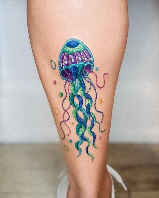 Medium Embroidery Jellyfish Tattoo on Women Leg by @gyeong_.tt