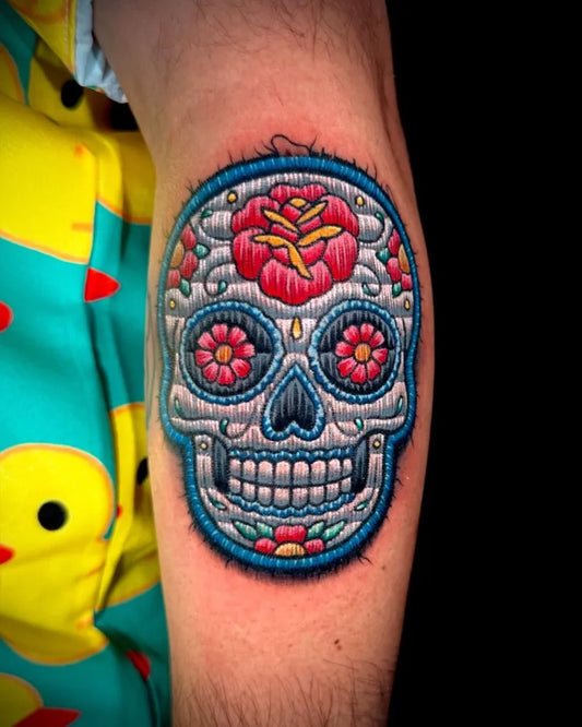 Medium Embroidery Sugar Skull with Rose Tattoo on Men Arm by @cj_ugarte