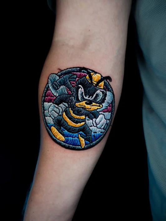 Medium Embroidery Wasp Tattoo on Women Arm by @ar2ta2