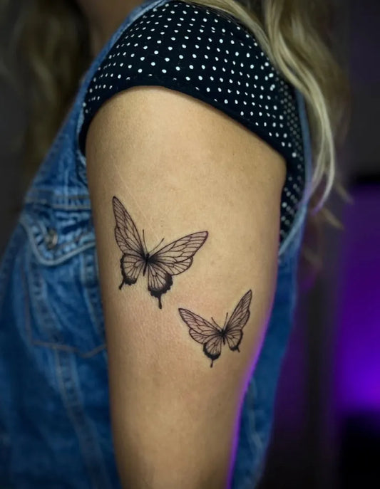 Fine Line Butterflies on Women Upper Arm Tattoo by @charlotparis_inks