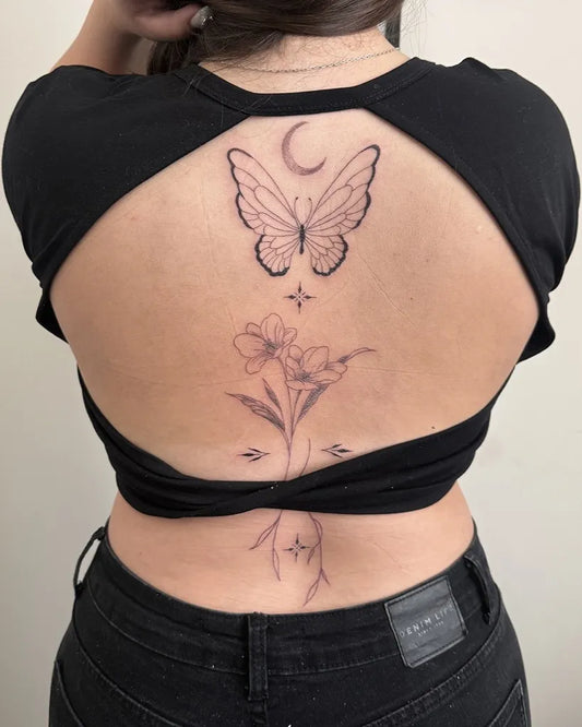 Fine Line Butterfly Moon Flower on Women Back Tattoo by @pulsar.tattoo
