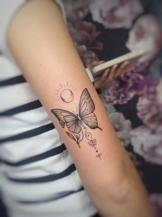 Fine Line Butterfly Sun Plant on Women Upper Arm Tattoo by @w_punkt_tattoo
