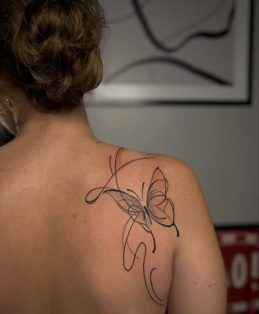 Fine Line Butterfly on Women Shoulder Tattoo by @ogunkokcektattoox