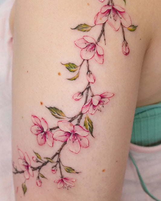 Medium Fine Line Cherry Blossom Branch on Women Arm Tattoo by @suya_ink