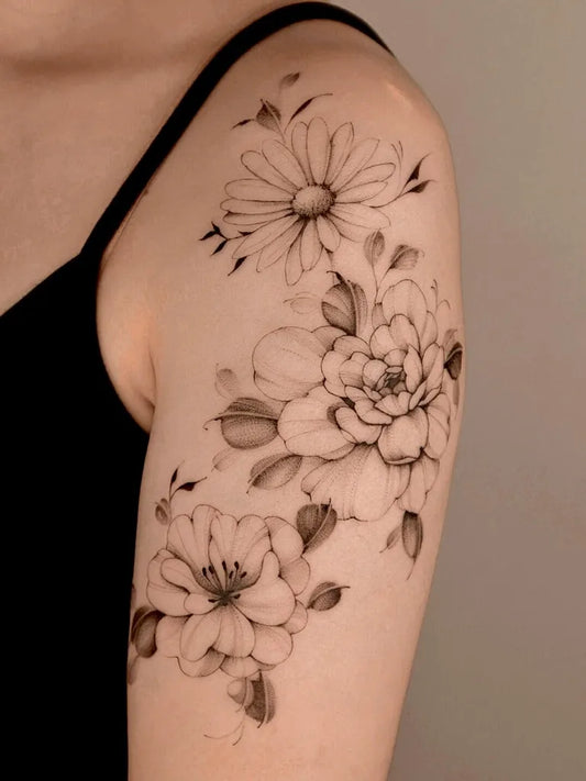 Medium Fine Line Daisy and Peony Women Shoulder by @mo_tattooist