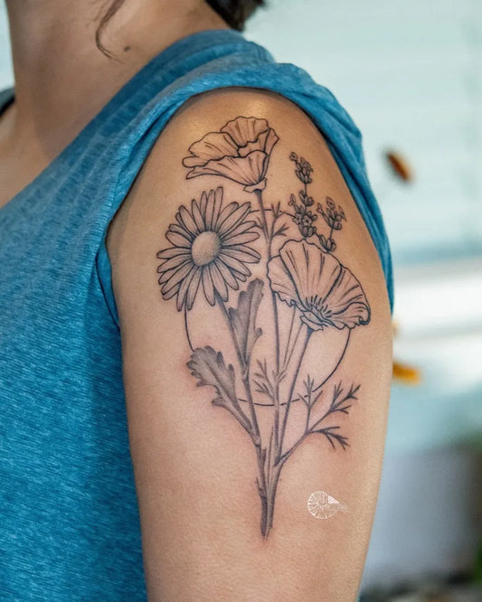 Medium Fine Line Daisy and Poppies Tattoo on Women Shoulder by @kraken.queen_tattoo