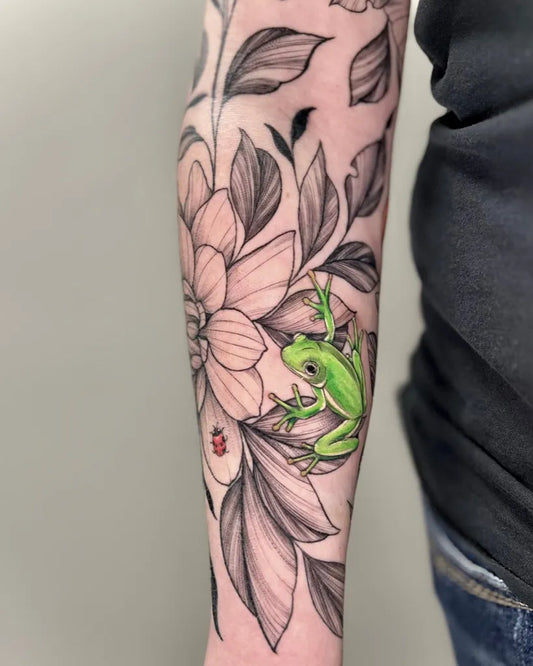 Medium Fine Line Frog and Flower and Ladybug Nature Tattoo on Women Arm by @ink.malena
