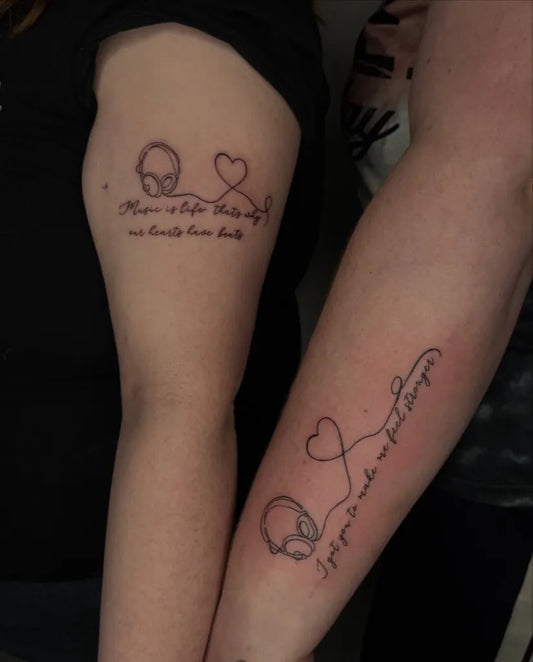 Medium Fine Line Headphones Heart Quote Tattoo on Women Arm by @tattoo_tulacz