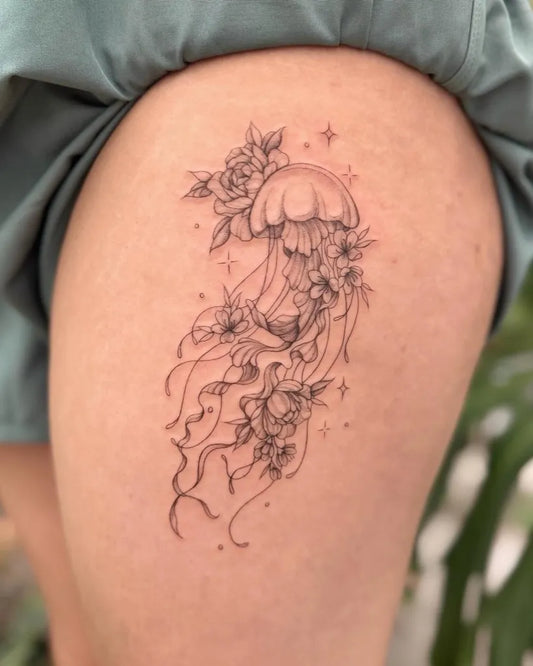 Medium Fine Line Jellyfish and Roses Tattoo on Women Thigh by @nganvu.tattoo