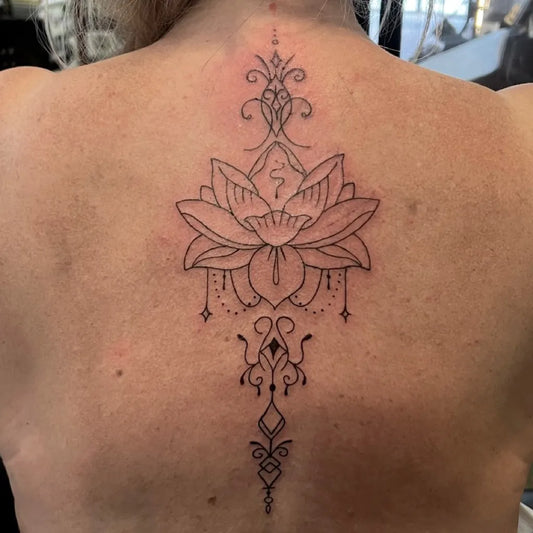 Medium Fine Line Lotus Flower Mandala on Women Back Tattoo by @emclarktattoos