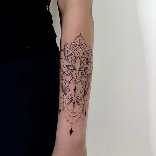 Medium Fine Line Mandala Tattoo on Women Forearm by @blackswantattoouppsala