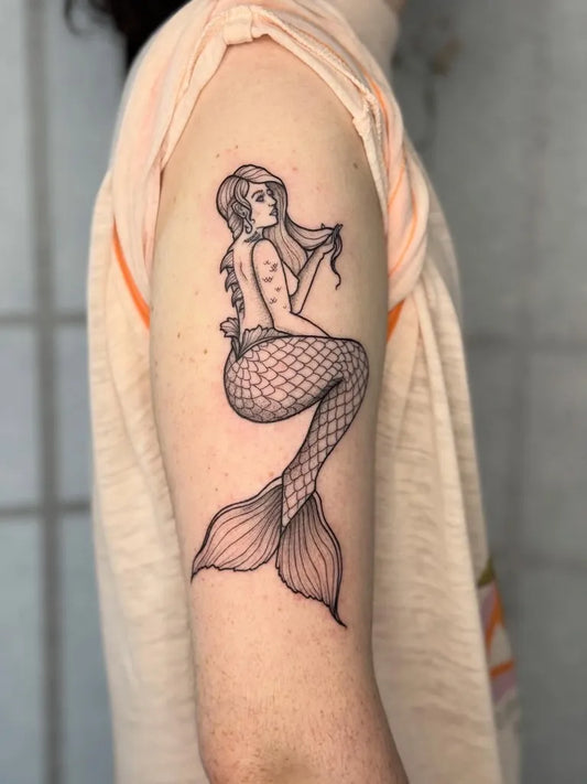 Medium Fine Line Mermaid Tattoo on Women Arm by @noelle_adrienne