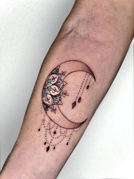 Medium Fine Line Moon Mandala Tattoo on Women Arm by @galiana_finetattoo