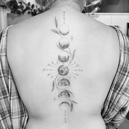 Medium Fine Line Moon Phases and Leaves Tattoo on Women Back by @parkermidnight