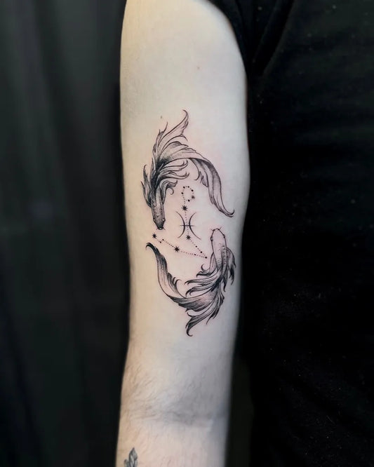Medium Fine Line Pisces Zodiac Tattoo on Women Arm by @jennainks