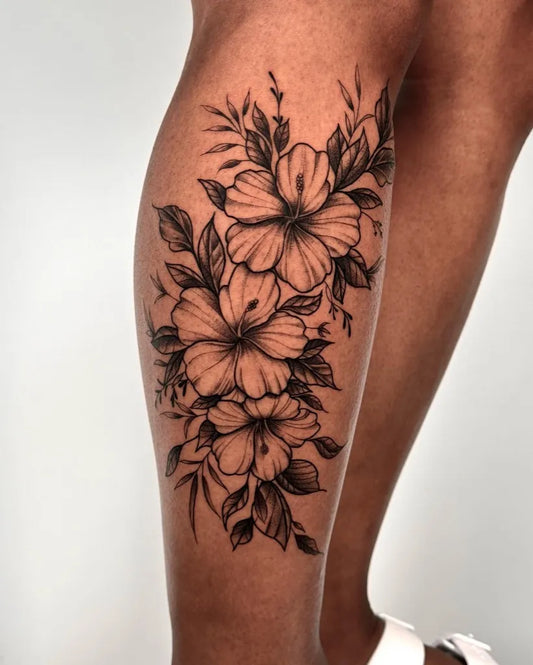 Medium FineLine HibiscusFlowers on Women Leg Tattoo by @nico.b_tattoos