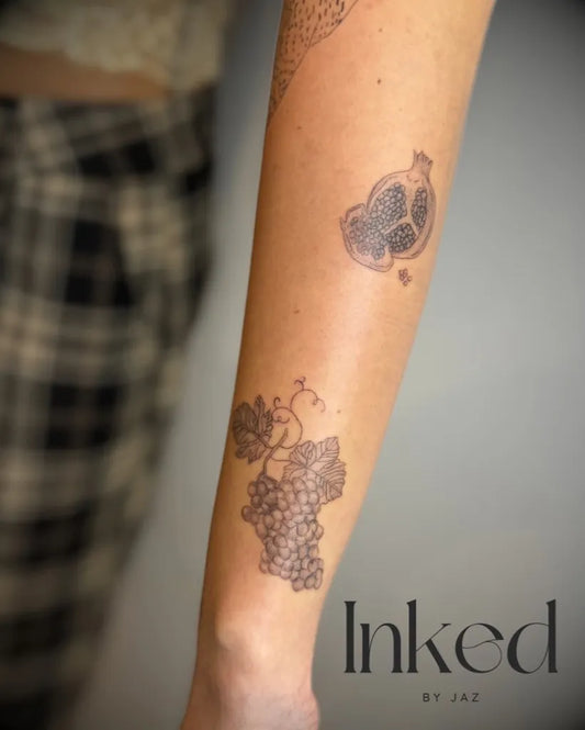 Medium FineLine Pomegranate GrapeVines on Women Arm Tattoo by @inked_byjaz_