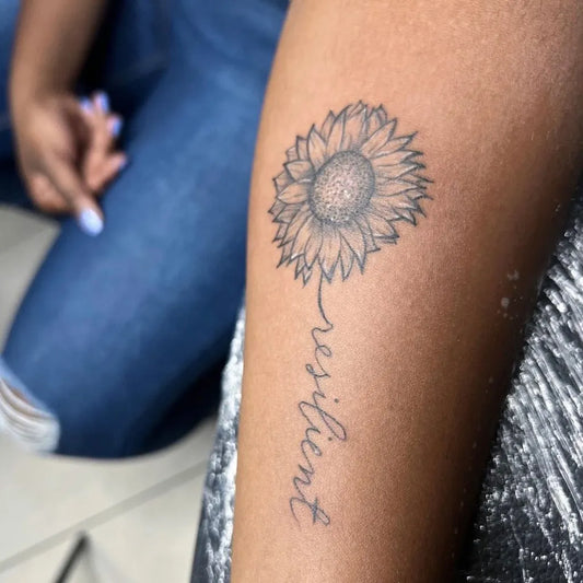 Medium FineLine Sunflower Resilient Women Thigh Tattoo by @ubinktattoos