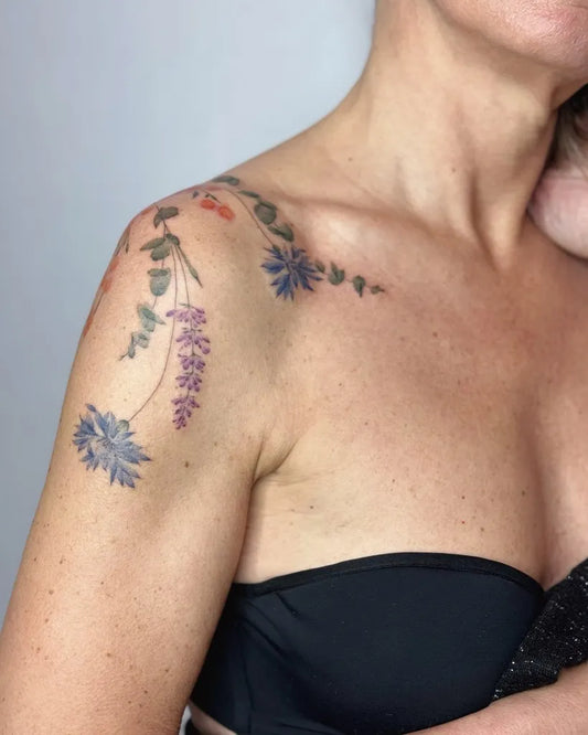 Medium Floral Botanical Flowers Tattoo on Women Shoulder by @eva_tattooist