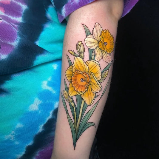 Medium Floral Daffodil Bunch Tattoo on Women Arm by @fabletattoogallery