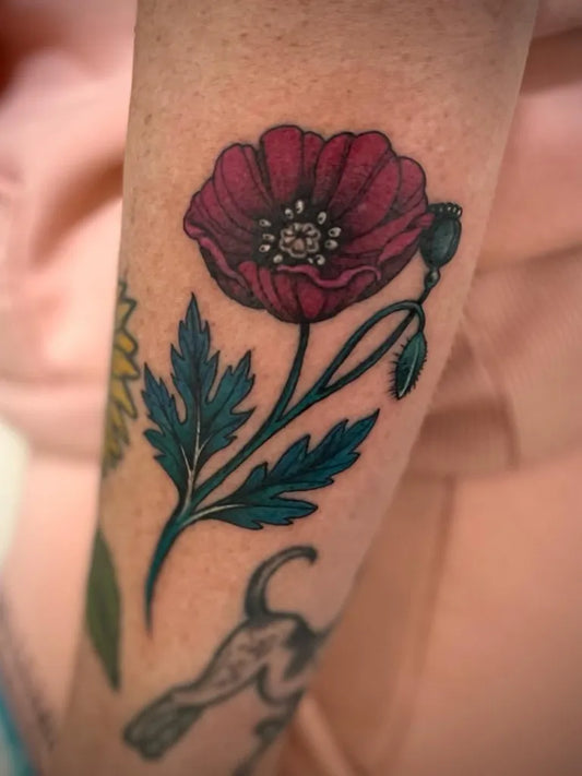 Medium Floral Poppy and Leaf Tattoo on Women Arm by @yagasara