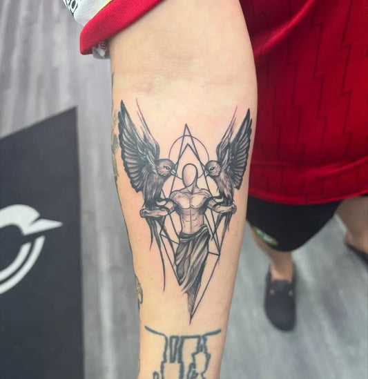 Medium Geometric Angel Figure on Men Arm Tattoo by @v.tattoo_