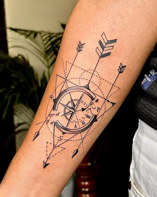 Medium Geometric Compass Arrow Tattoo on Women Arm by @backbenchertattoostudio