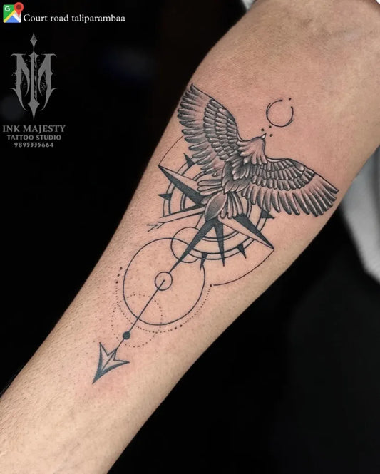 Medium Geometric Eagle Compass Tattoo on Men Arm by @tattoo_ink_majesty_taliparamba