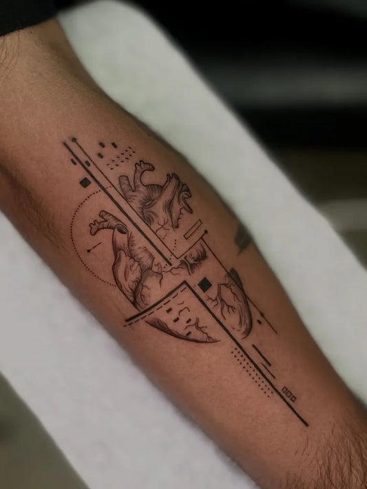 Medium Geometric Heart on Men Arm Tattoo by @ginktattooz
