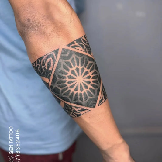 Medium Geometric Mandala Band on Men Arm Tattoo by @nexgentattoo