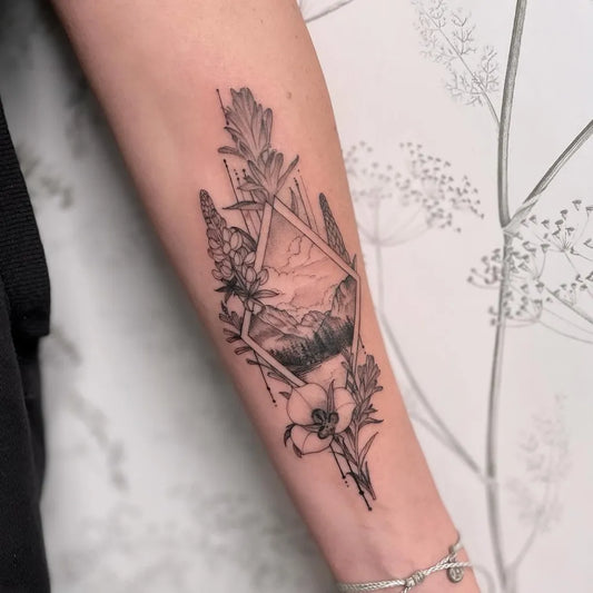 Medium Geometric Mountain Flowers Tattoo on Women Arm by @iamthepaintedlady