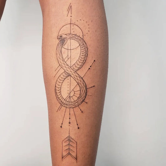 Medium Geometric Ouroboros Arrow Tattoo on Women Leg by @carolstasiaktattoo