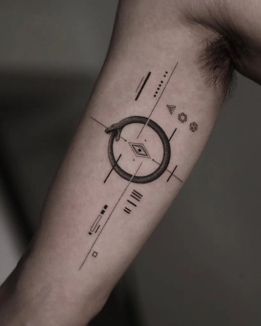 Medium Geometric Ouroboros Geometric Tattoo on Men Arm by @zink.tt