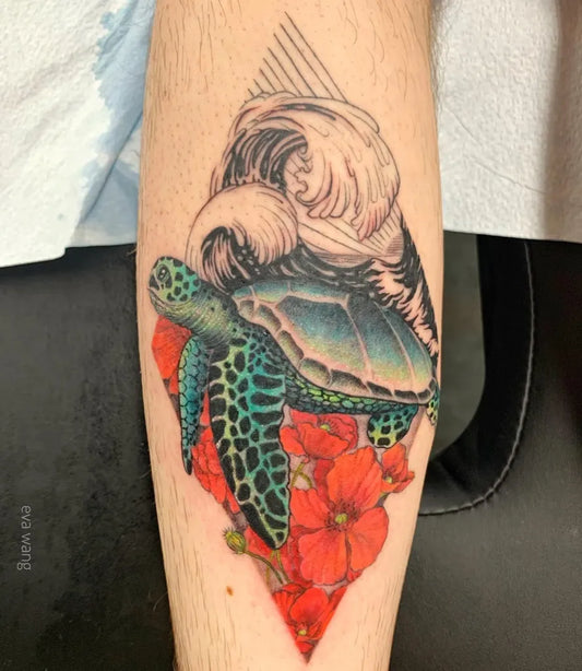 Medium Geometric Sea Turtle and Flowers Tattoo on Men Arm by @evaink.art