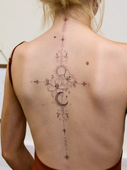 Medium Geometric Sun Moon Cross on Women Back Tattoo by @amberbreeze.tattoo