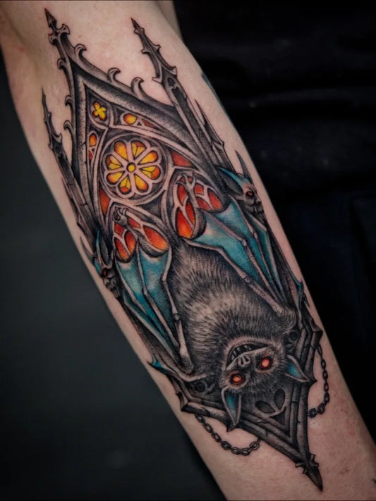 Medium Gothic Bat Stained Glass Window Tattoo on Men Arm by @blvckavra