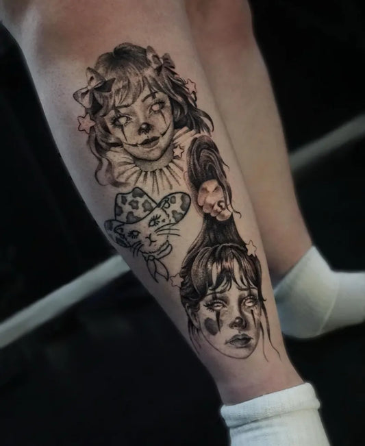 Medium Gothic Doll Faces and Butterfly Tattoo on Women Thigh by @ssophietattoos