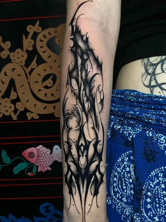 Medium Gothic Flaming Skull Tattoo on Women Arm by @akira.art