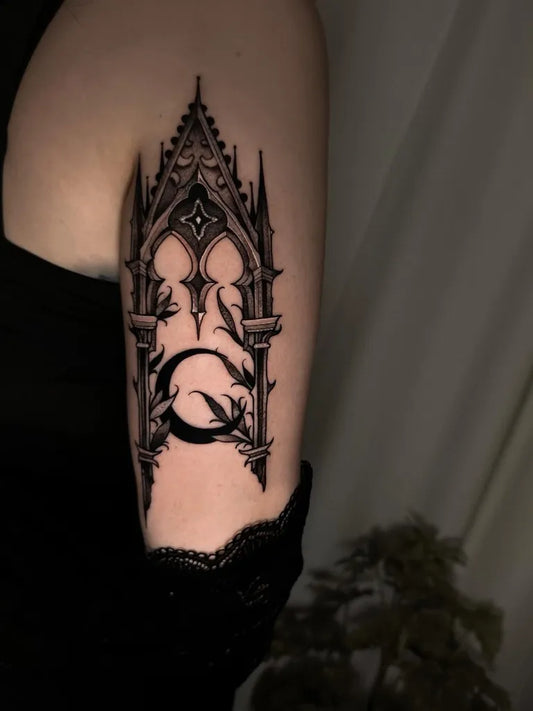 Medium Gothic Gothic Arch Crows Tattoo on Women Upper Arm by @louise.amott