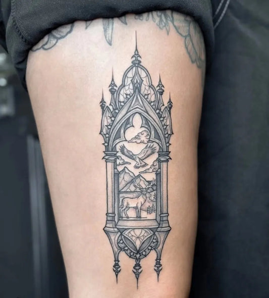 Medium Gothic Gothic Window with Mountain and Deer Tattoo on Women Thigh by @14arrows.tattoo